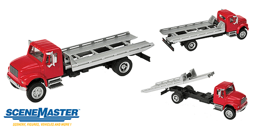 Assembled HO Scale Walthers Red International 4900 Roll-On/Roll-Off Flatbed SceneMaster